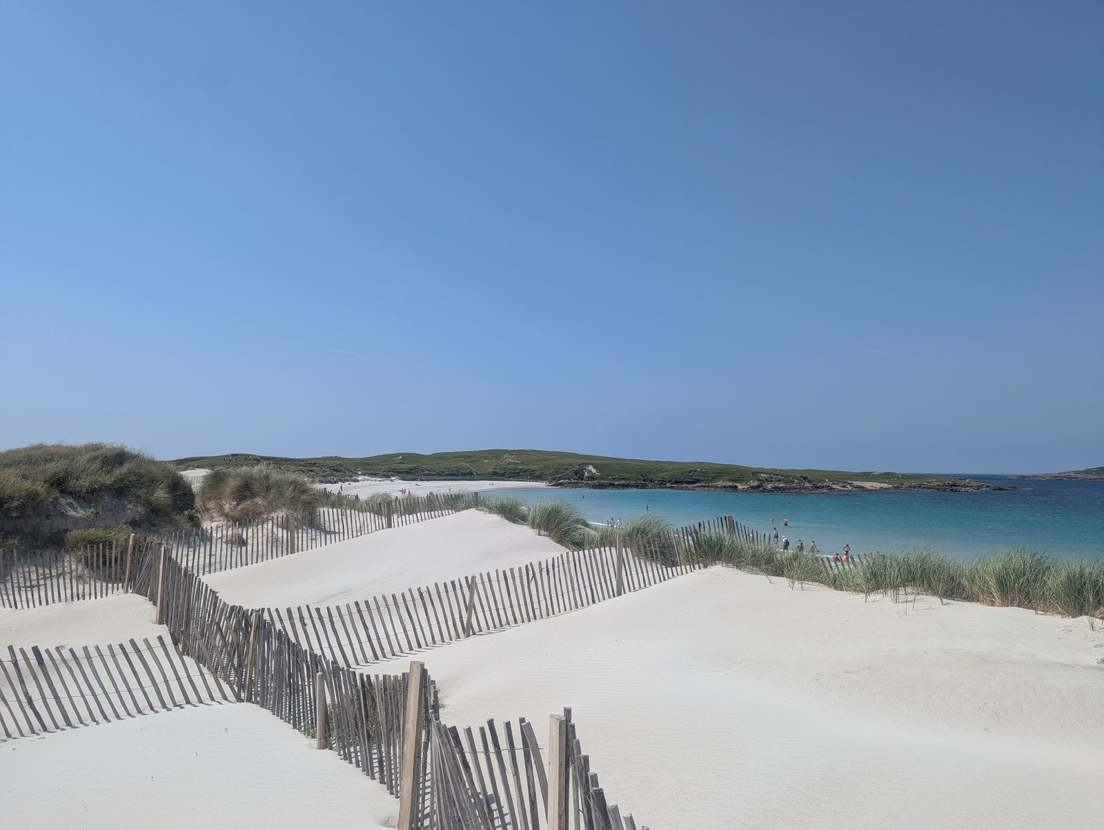 Dune and white sand where the sea comes into Dog's Bay near Roundstone