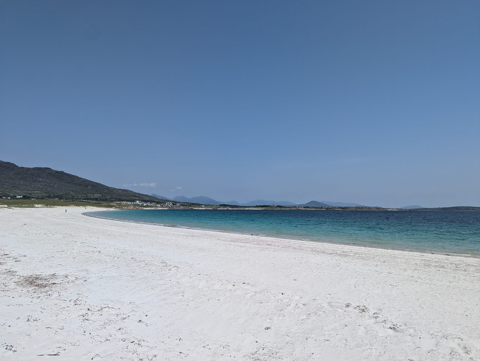 The wide white-sand curve of Gurteen Bay with Errisbeg hill behind